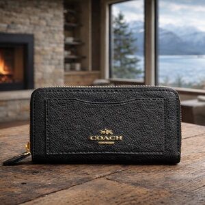 SOLD Coach Black Pebbled Zip Around Wallet with Gold Logo